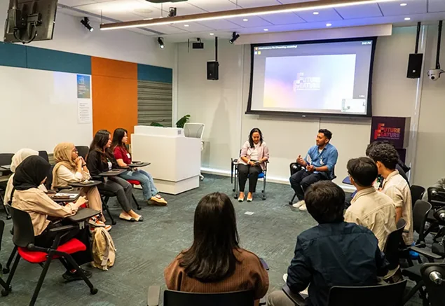 The audience listening during the session