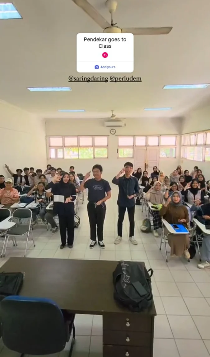 Team members presenting to a classroom of students during the roadshow