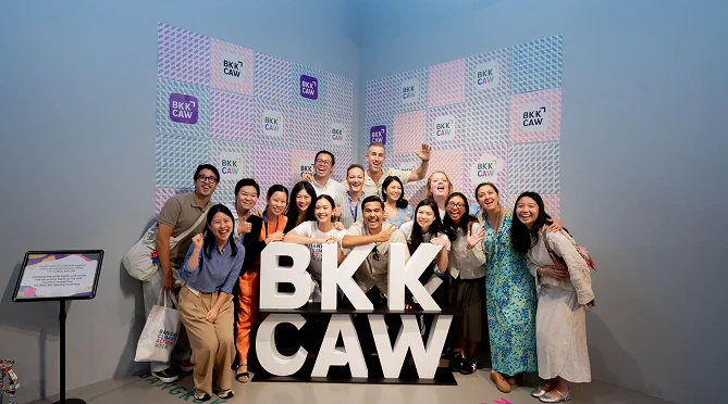 A group of participants posing with the BKKCAW letters