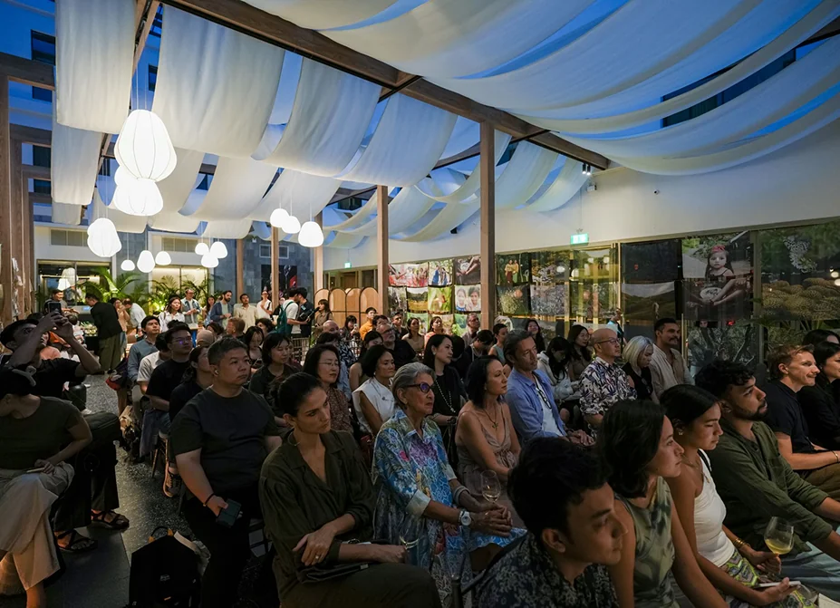 The festival audience beneath the canopy