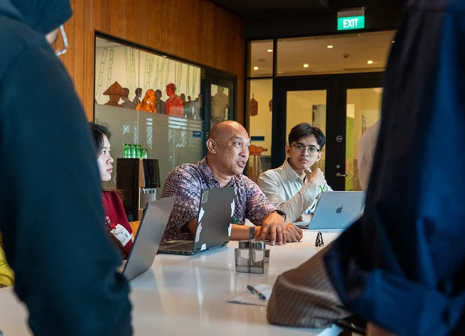 Students in discussion at the Google office